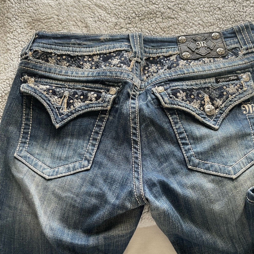 Miss Me Medium Blue Embellished Boot Cut Jeans   Semi distressed.